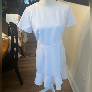 Beautiful White Dress with Ruffle at the Bottom